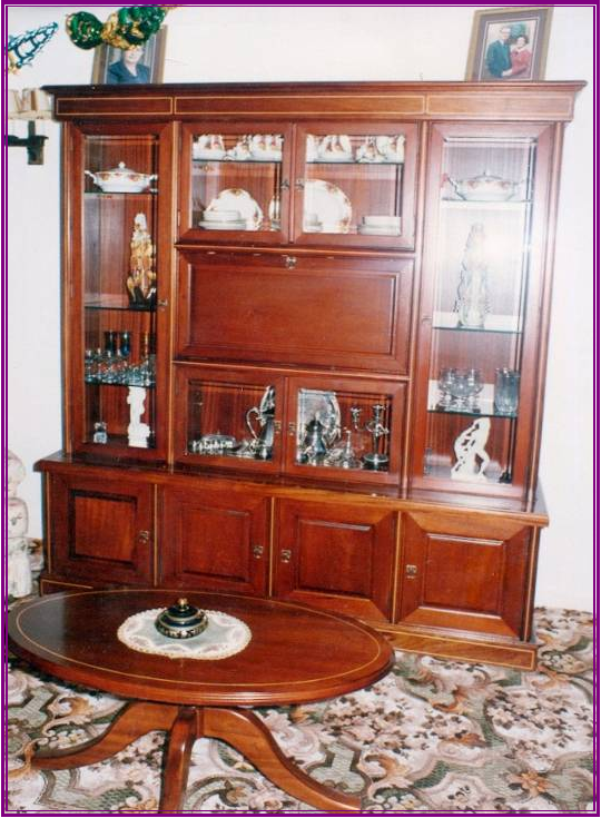 Mahogany display unit and Oval coffe table (boxwood inlays).