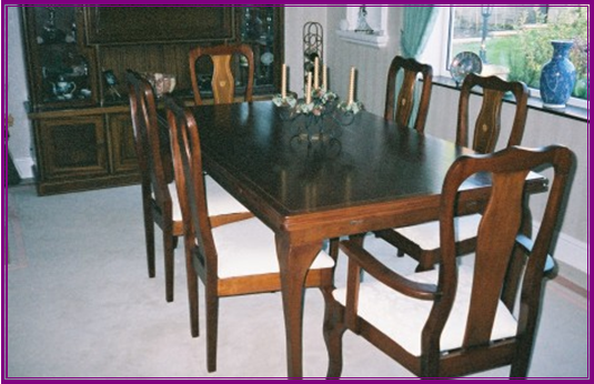 Mahogany dining suite with box and flower inlays 